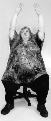 Photo of a large woman stretching
